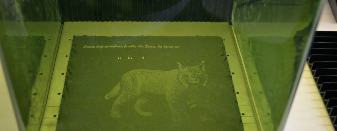 Laser engraving a slate table mat